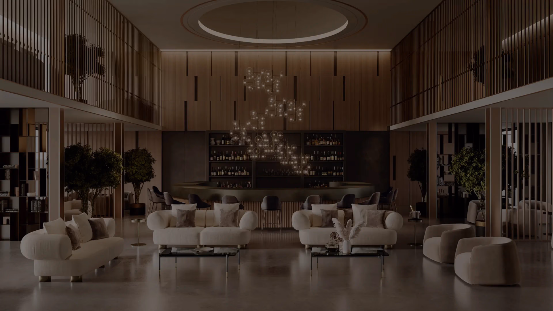 Bontempi rounded sofas, lounge chairs and tables arranged beneath glass pendants in a tall wood-lined room.