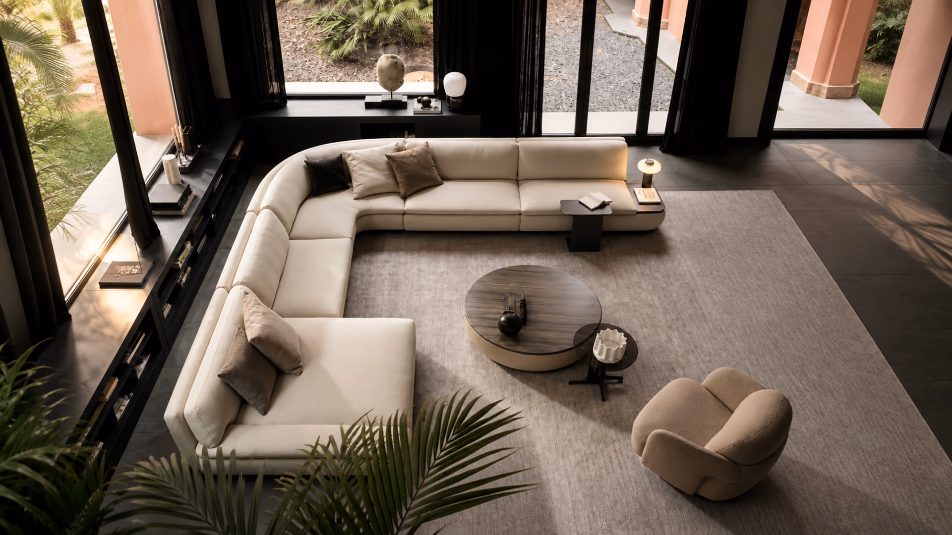 Ditre Italia cream sectional sofa and round coffee tables in a bright living room