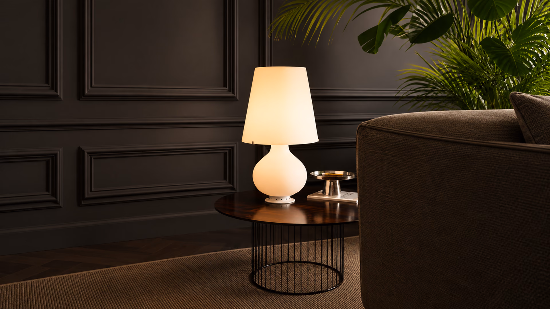 FontanaArte white glass Fontana table lamp in a contemporary interior