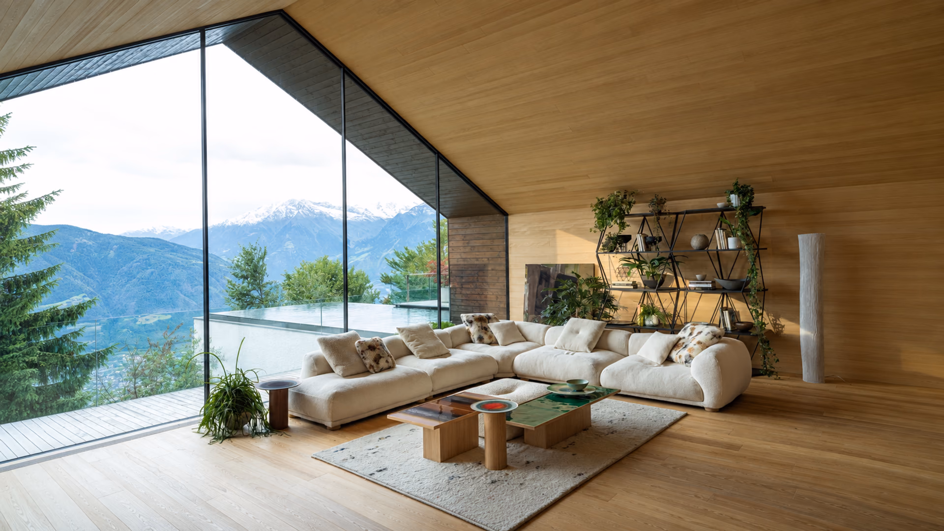 Moroso Me-Time modular sofa in a wood-lined living room overlooking mountains