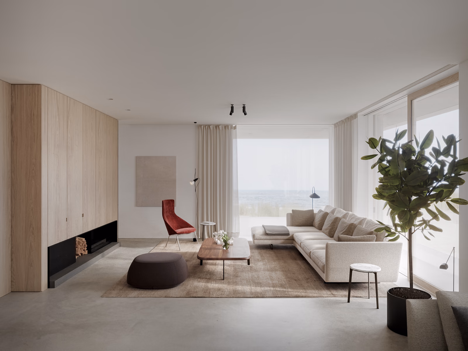Bensen: A Savoy sectional creates a relaxed seating area in a contemporary room with a fireplace.