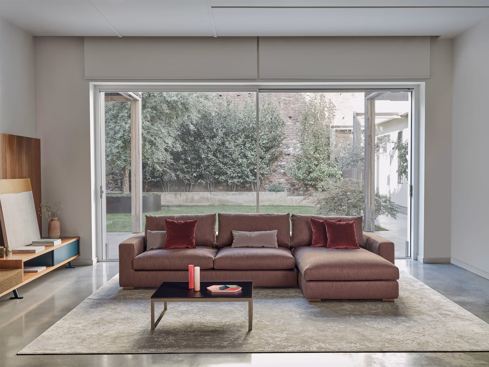 Bontempi: A Sunset sofa with a chaise provides an inviting focus for a contemporary living room.