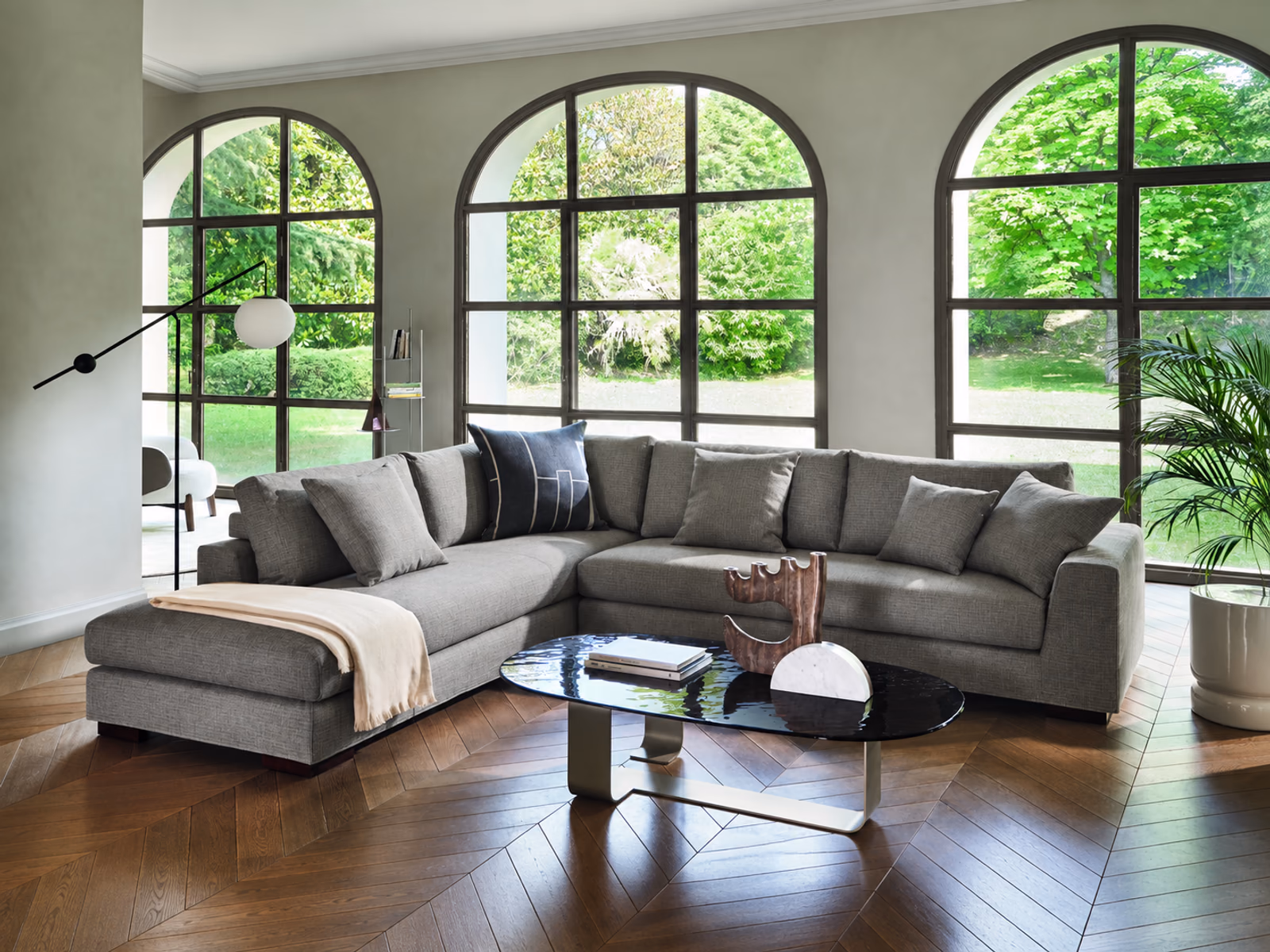 Calligaris: A Sierra sofa anchors a contemporary living room with upholstered seating and occasional tables.