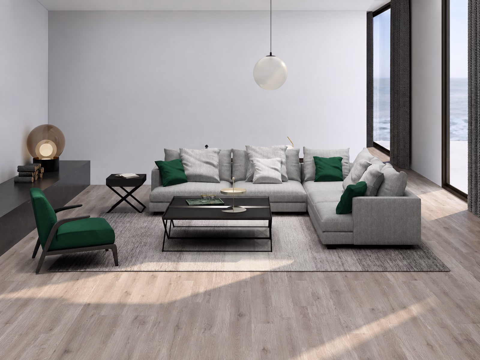 Camerich: A gray Easytime sectional and a green lounge chair frame a low black coffee table beside tall windows.