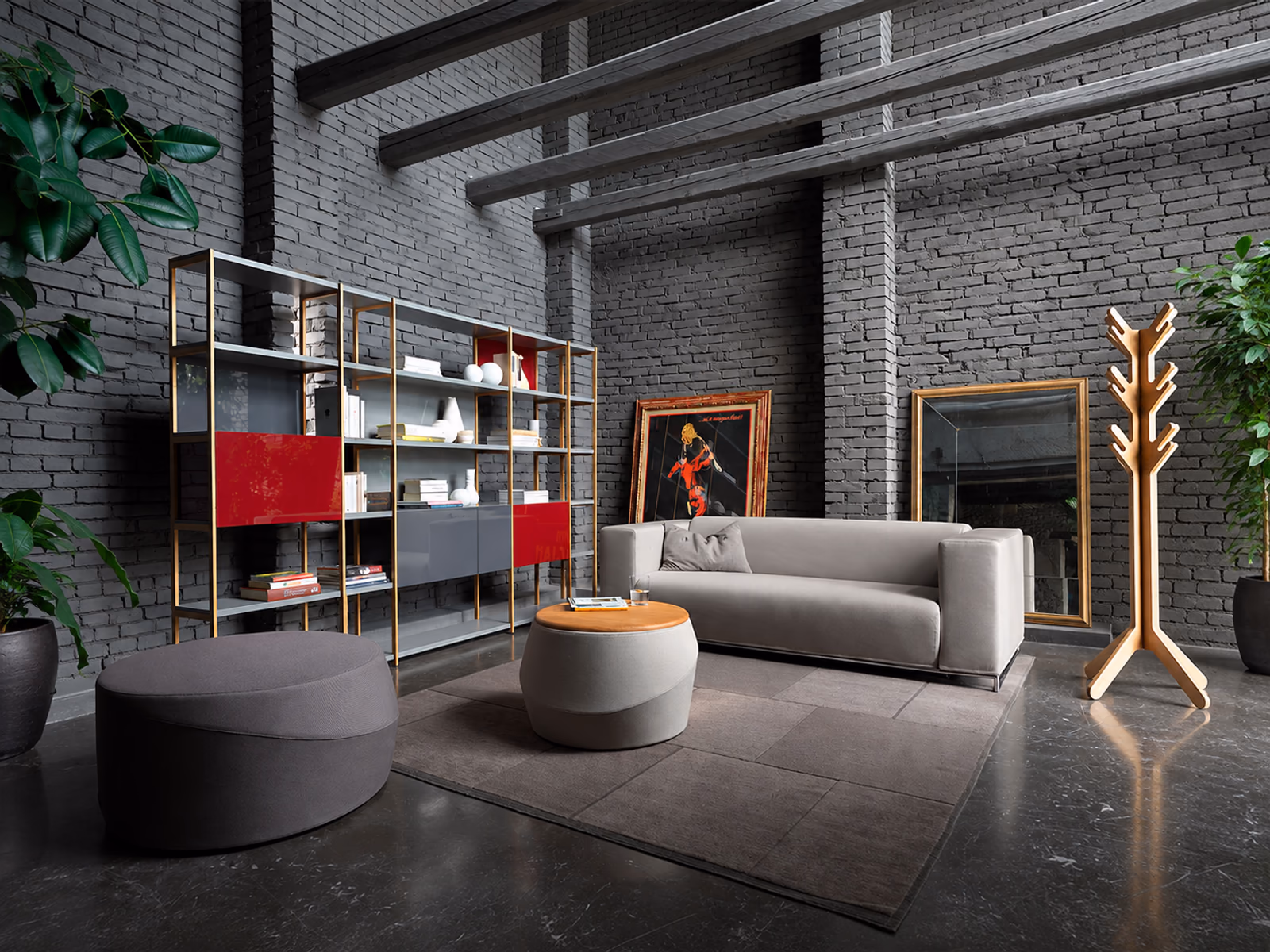 Casamania: Giro poufs accompany a gray sofa in a relaxed living space.