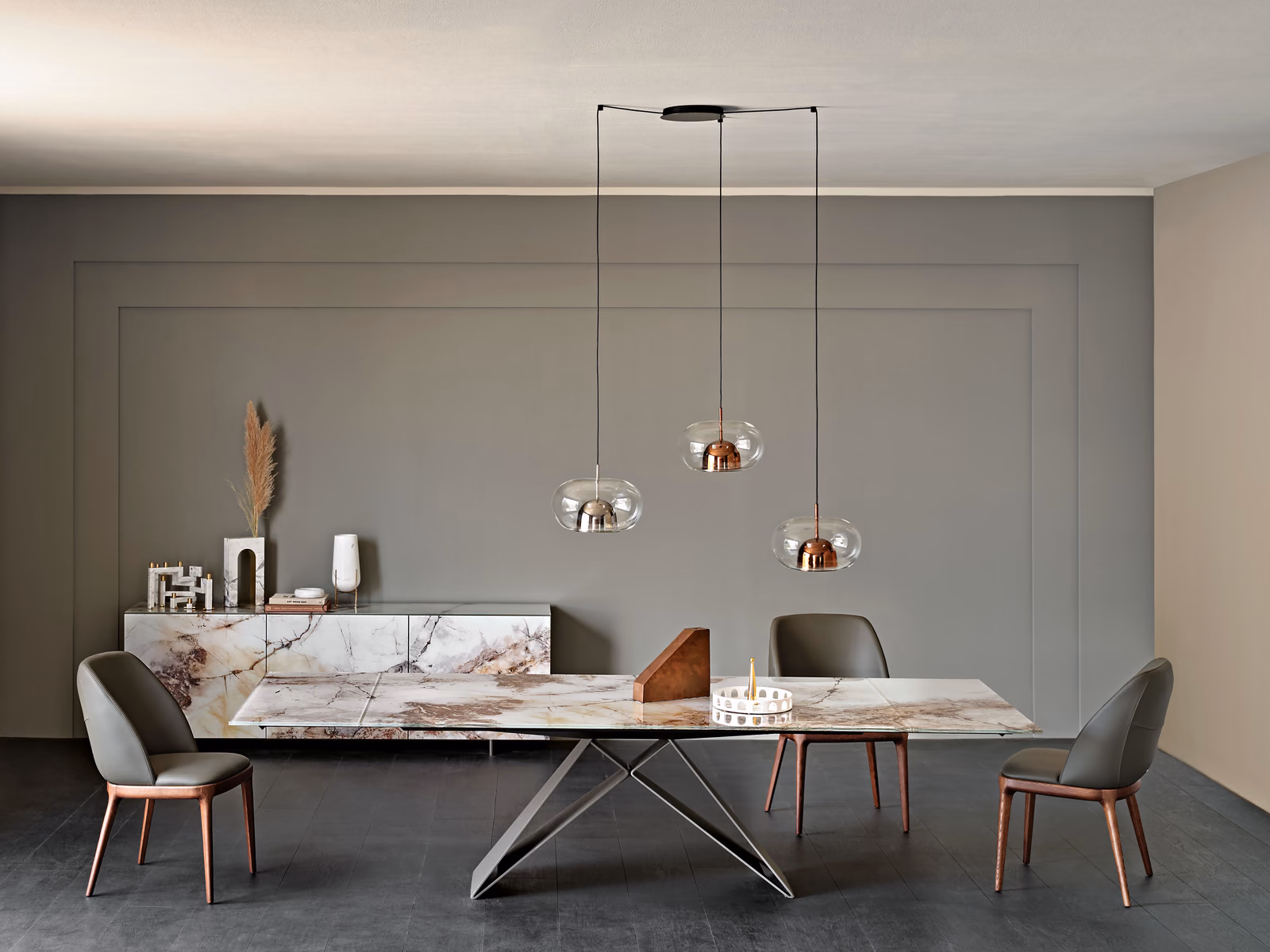 Cattelan Italia: A Premier Crystalart Drive table anchors a contemporary dining room.