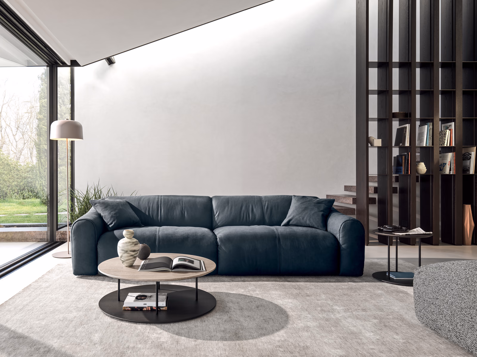 Ditre Italia: A blue Daily sofa brings upholstered comfort to a contemporary Ditre Italia living room.