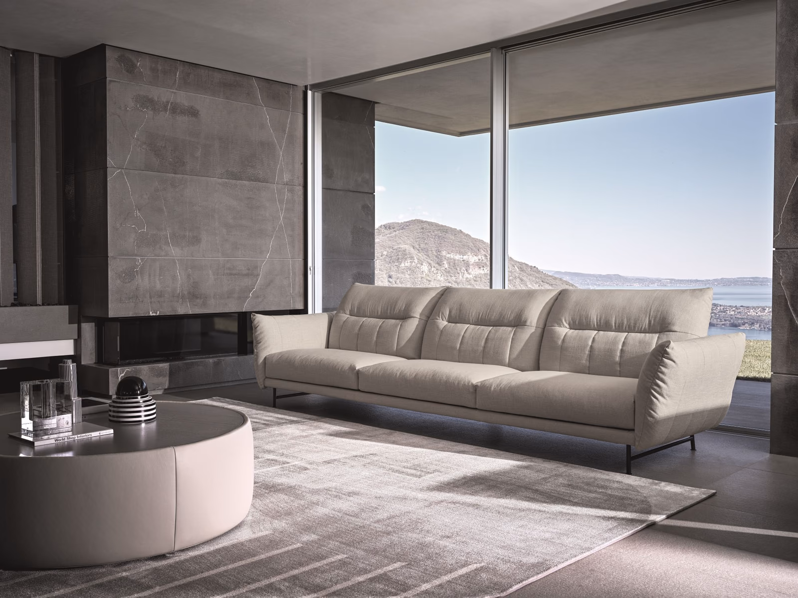 Ditre Italia: An On Line sofa defines a relaxed living space with a broad seating arrangement.