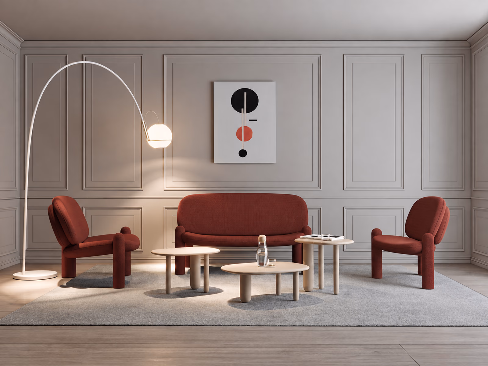 Driade: A red Tottori sofa and matching chairs surround pale occasional tables in a paneled room.