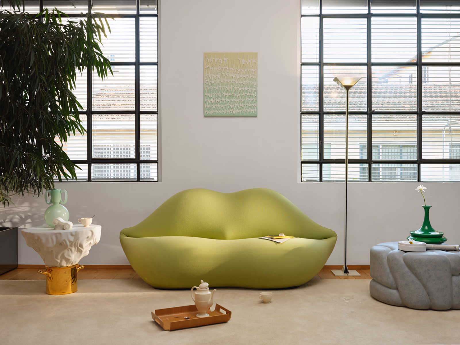 Gufram: A lime-colored Bocca sofa brings its distinctive lips silhouette to a playful interior.