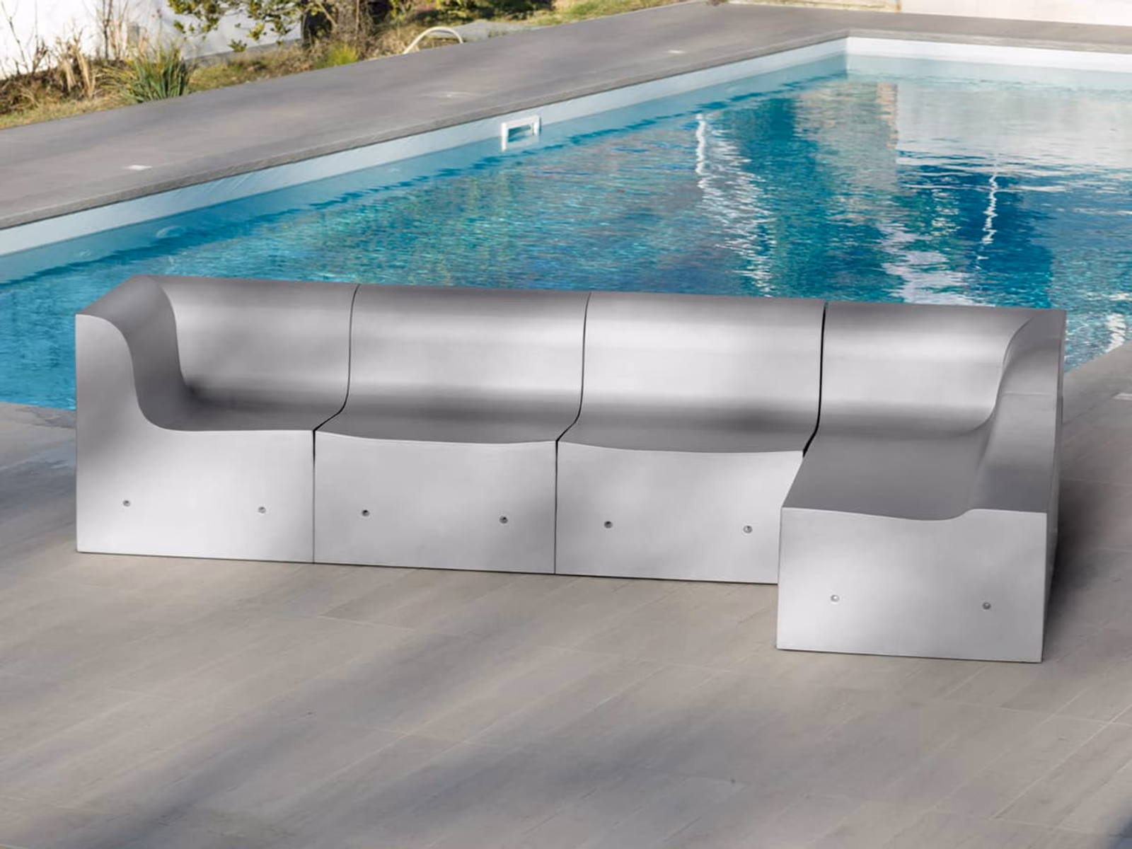 Gufram: Softcrete seating forms a sculptural outdoor composition beside the pool.