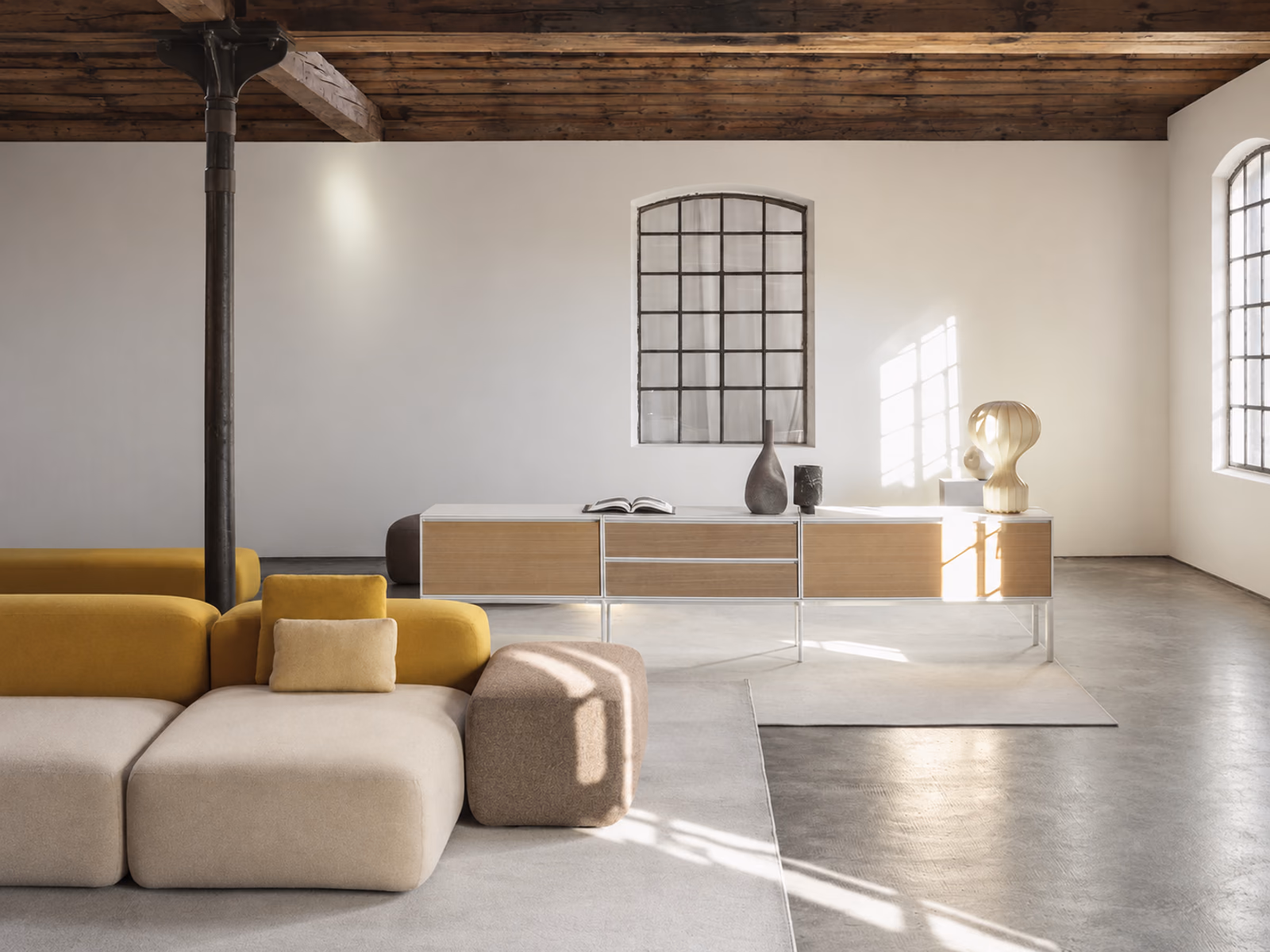 LaPalma: Cream and yellow PLUS seating modules furnish a loft with an open, light-filled interior.
