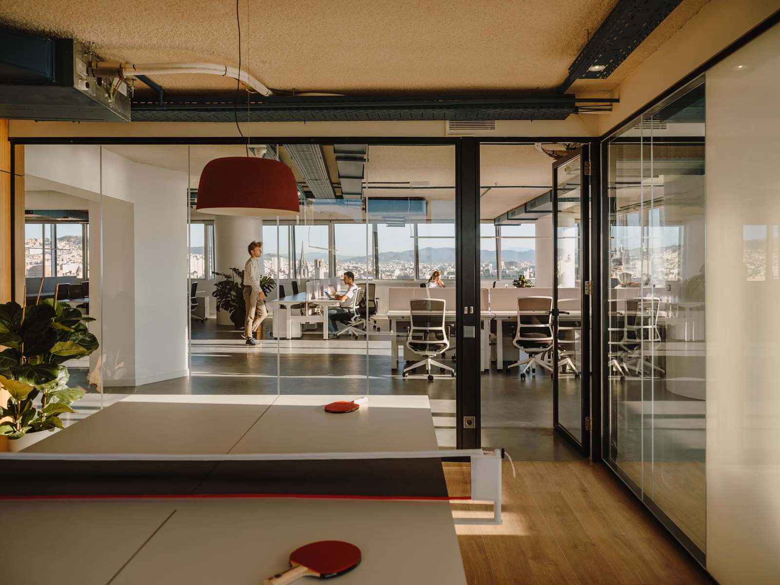 Marset: Djembé lighting defines a contemporary shared workspace.