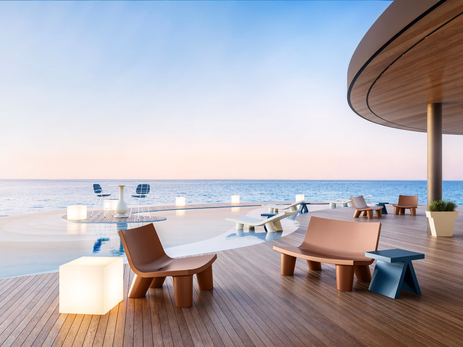 Slide: Low Lita Love seating creates a relaxed lounge on a sunlit deck.