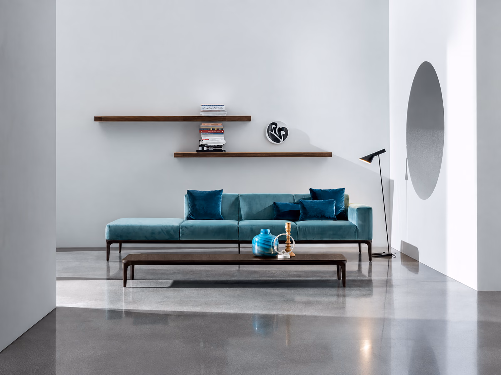Sovet: A teal Slim sofa and a long low table furnish a pared-back living room.