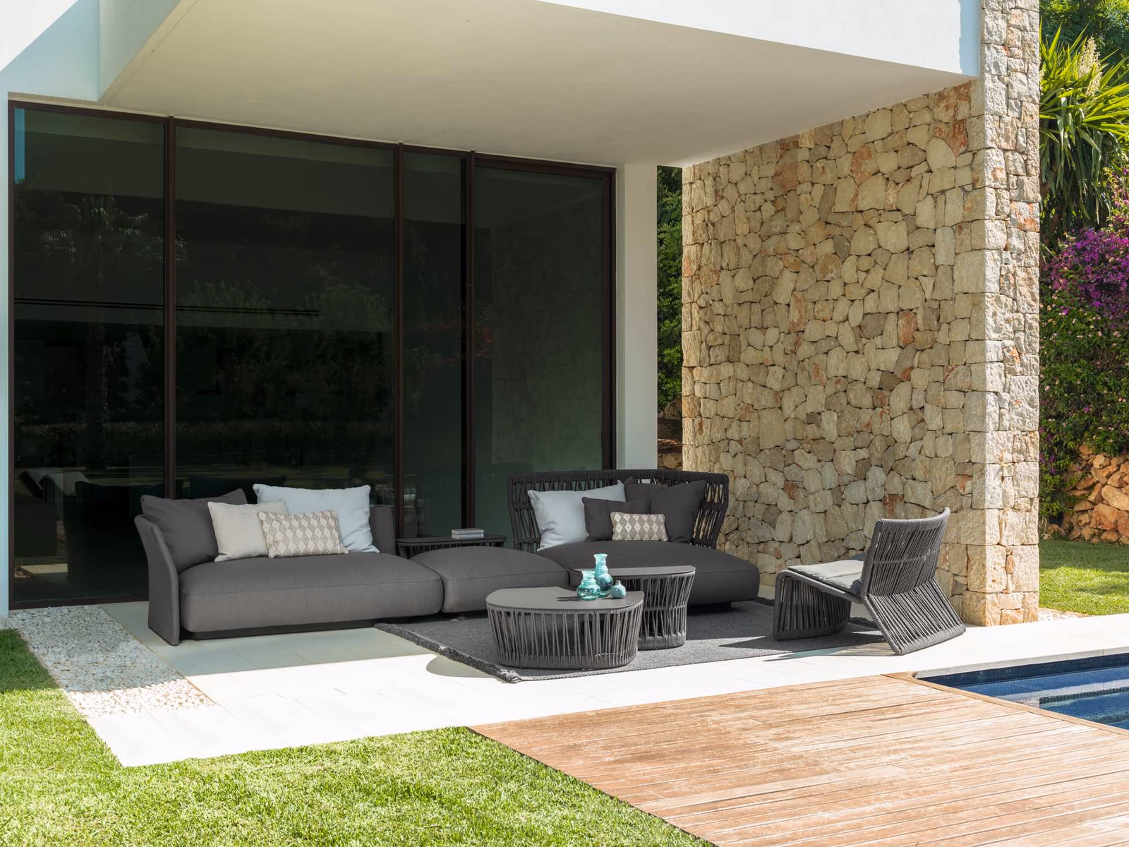 Talenti: Cliff seating combines a gray outdoor sofa with rope-backed lounge furniture.
